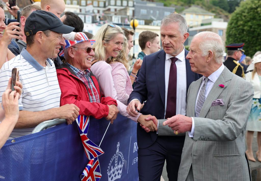 His Majesty the King's close protection team dealing with a security issue during their visit to Jersey for the Channel Islands tour