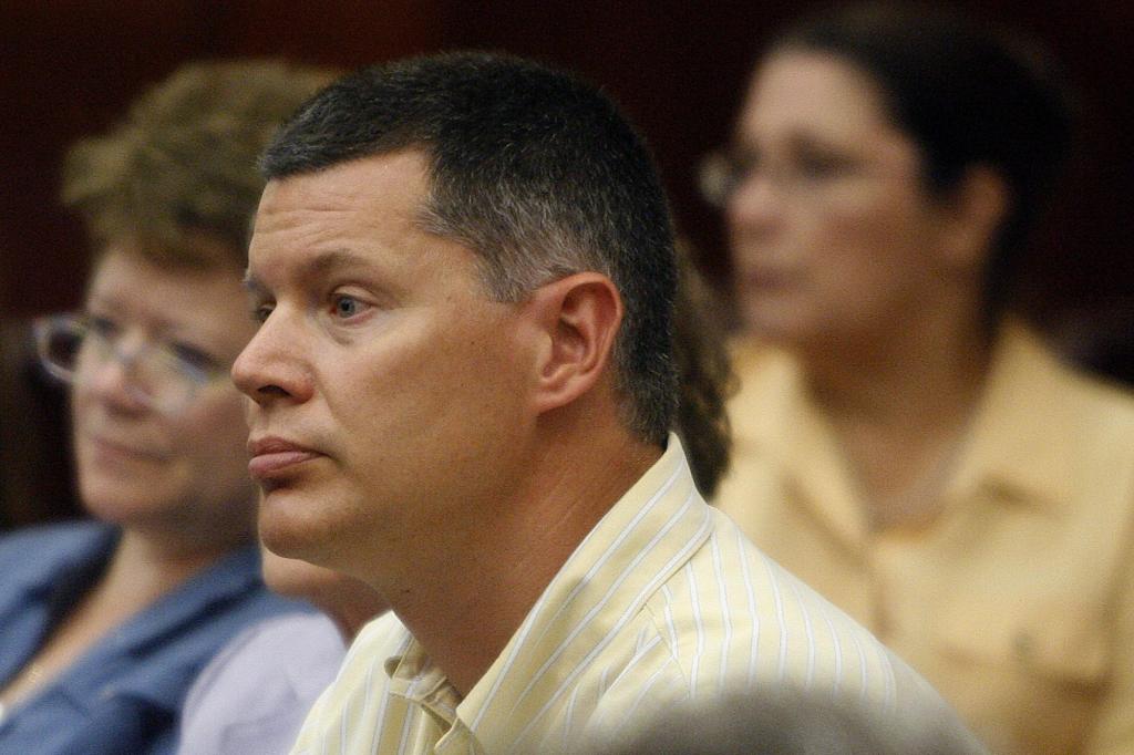 Rusty Yates listens to closing arguments in his ex-wife Andra Yates' retrial July 24, 2006 in Houston, Texas. Yates' 2002 capital murder conviction for drowning her five children in a bath tub was overturned by an appeals court because of false testimony by the state's expert psychiatric witness.