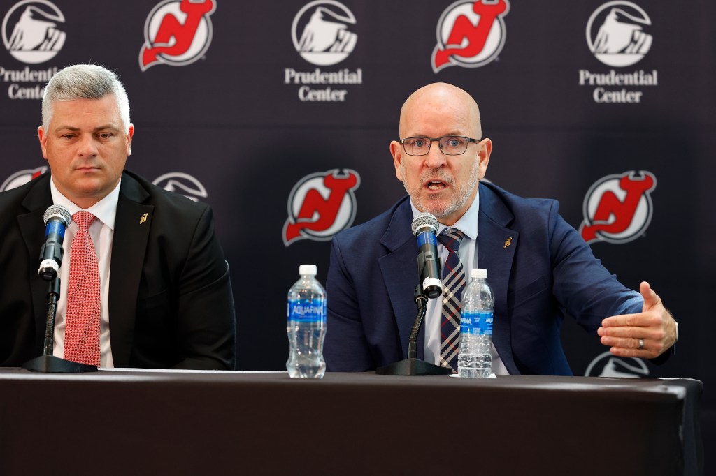 Devils general manager Tom Fitzgerald talks about the hiring of new NHL hockey team head coach Sheldon Keefe, left, during press conference Tuesday, May 28, 2024, in Newark, N.J.