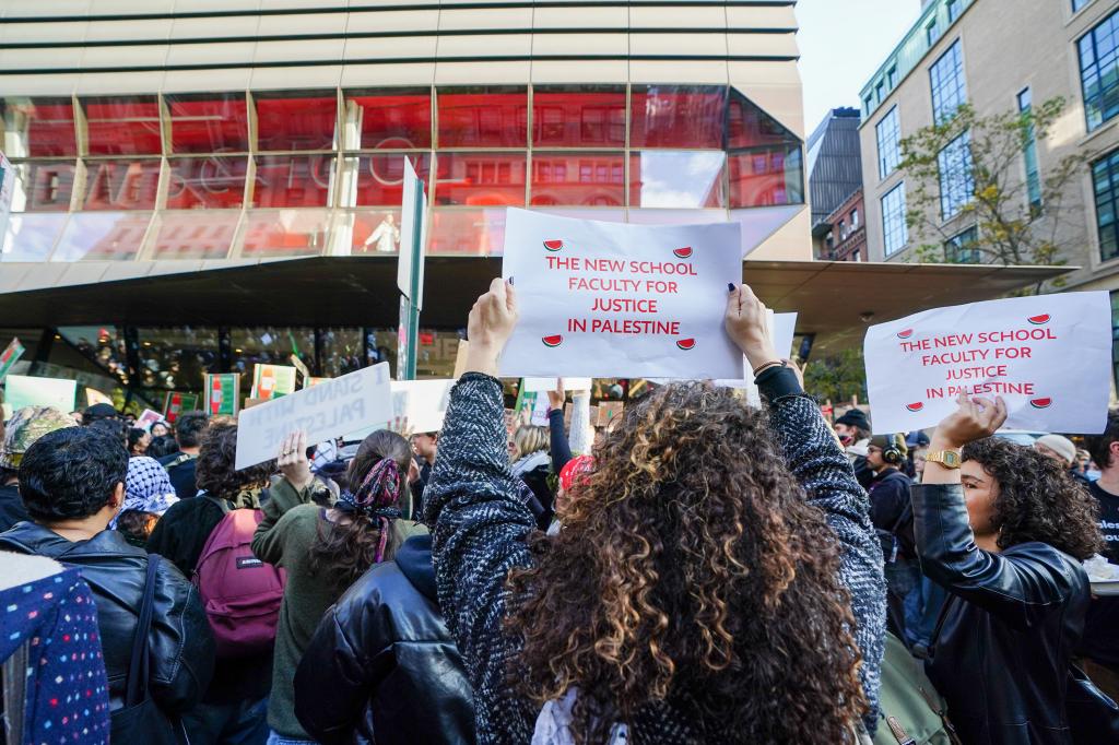 New School faculty holding Pro-Palestine protest signs in front of The New School on 5th Ave at East 13 St., Manhattan