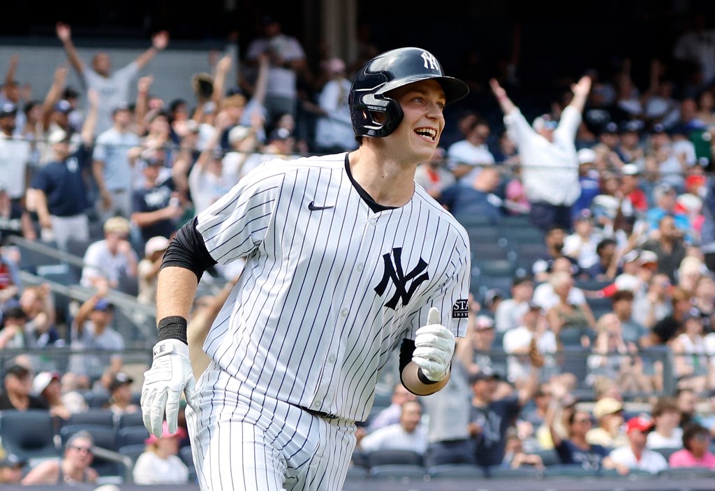 Ben Rice #93 rounds the bases on his first career home run a solo homer during the 5th inning against the Reds on the Fourth of July.