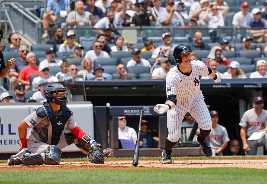 Yankees first baseman Ben Rice #93 flips his bat after he hits a solo home run during the first inning.