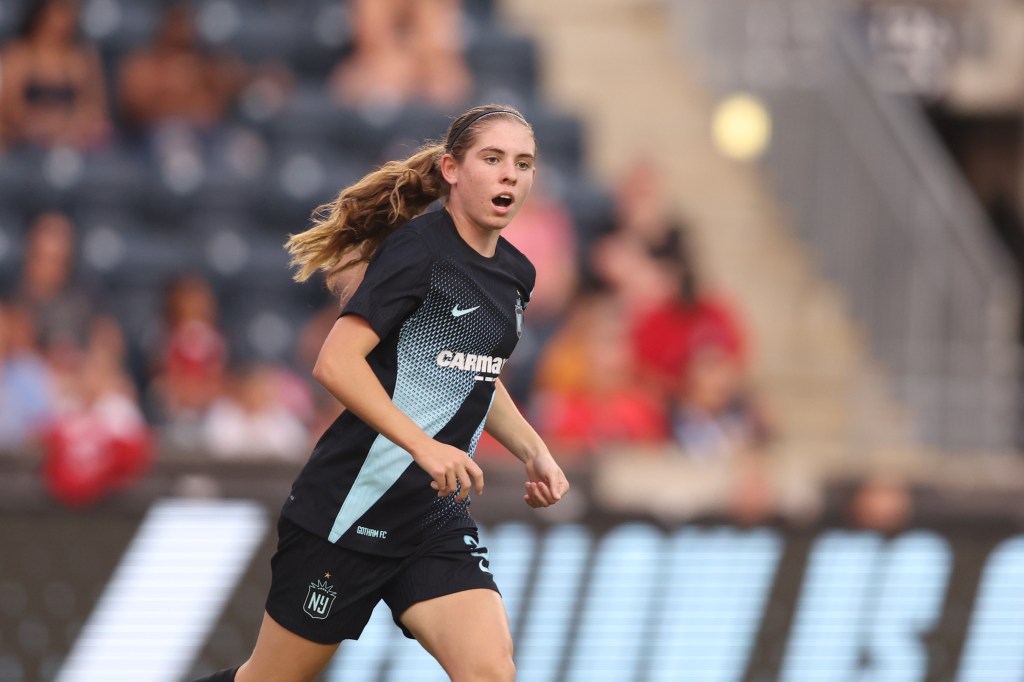 Gotham FC forward McKenna Whitham, 14, runs down the pitch against Washington Spirit during the second half on July 28, 2024 as she became the youngest player to play pro soccer in the U.S. 