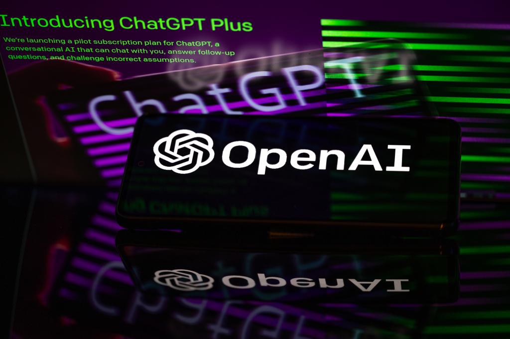 OpenAI logo displayed on a smartphone, with ChatGPT 4 in the background, in a photo illustration taken in Brussels, Belgium, on September 20, 2023.