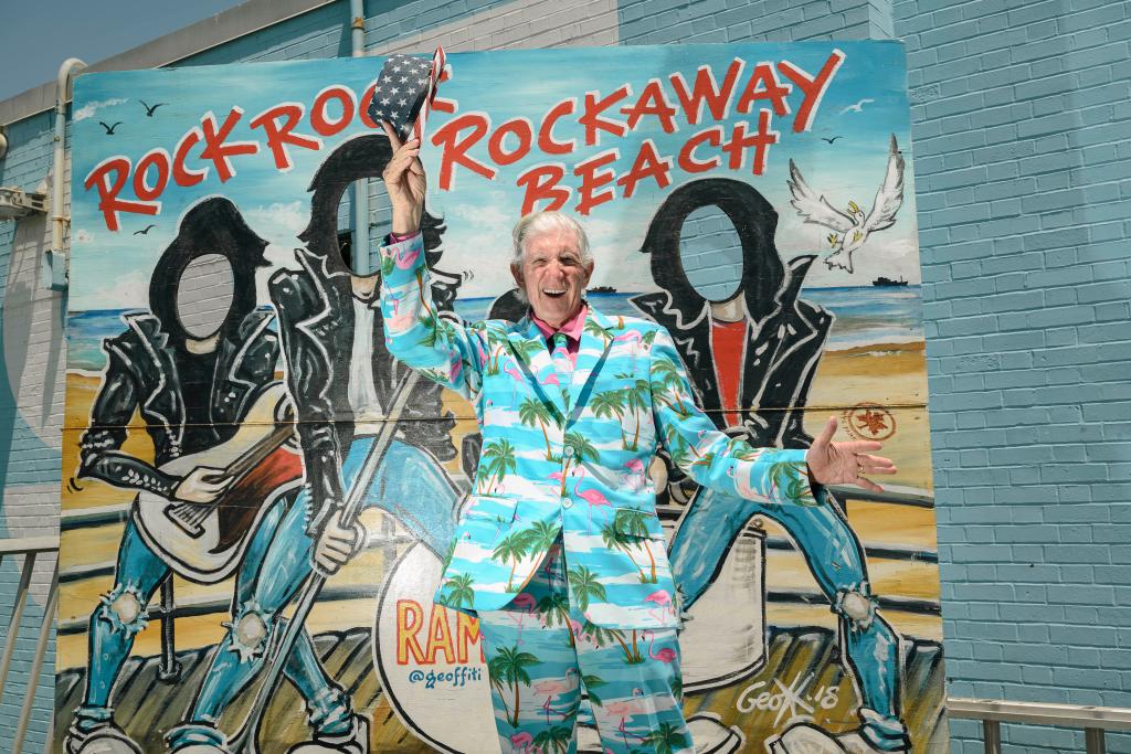 Owen Loof, titled as 'The Best Dressed Man in Rockaway', wearing his favorite flamingo suit on Rockaway Beach boardwalk, Queens, NY