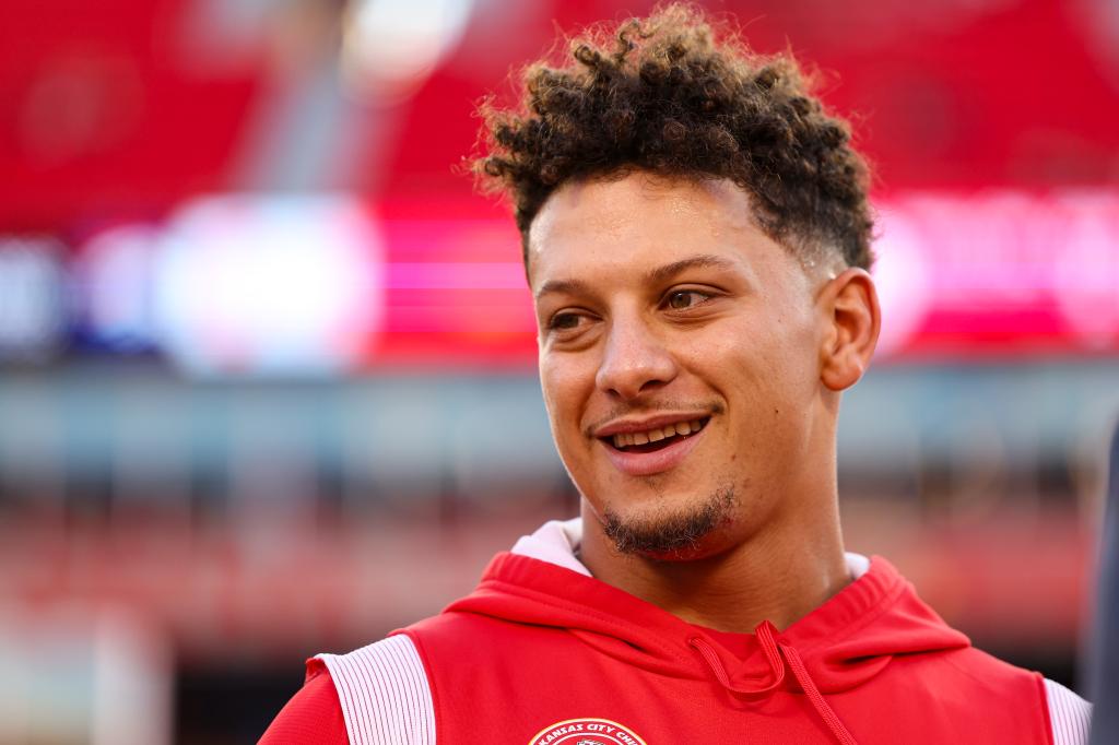 Patrick Mahomes #15 of the Kansas City Chiefs warms up prior to an NFL football game against the Denver Broncos at GEHA Field at Arrowhead Stadium on October 12, 2023 in Kansas City, Missouri. 