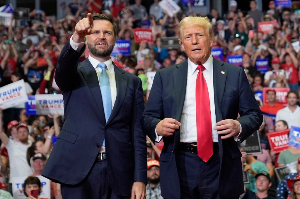 Republican presidential candidate former President Donald Trump and Republican vice presidential candidate Sen. JD Vance, R-Ohio, arrive at a campaign rally, Saturday, July 20, 2024, in Grand Rapids, Mich.