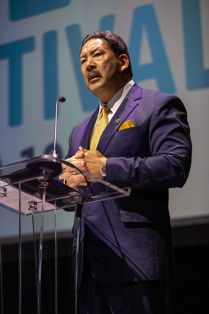 Seattle Mayor Bruce Harrell speaking at the podium during the 2024 Seattle International Film Festival Opening Night Gala at Paramount Theatre