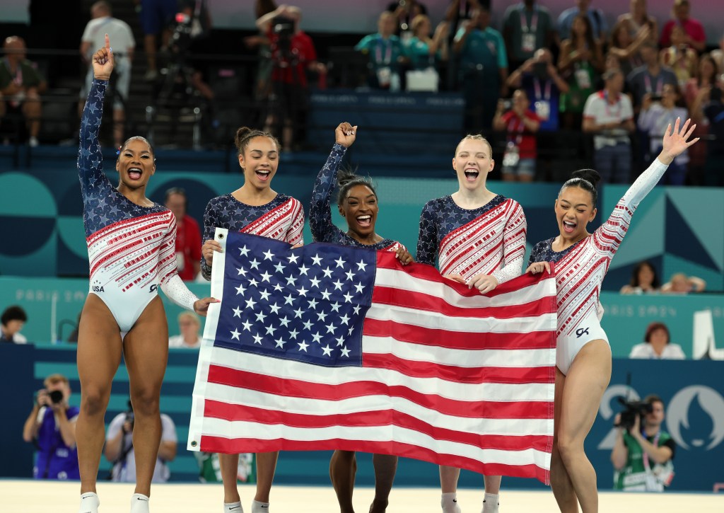 Team USA celebrates their win in the gymnastics team final on July 30, 2024.