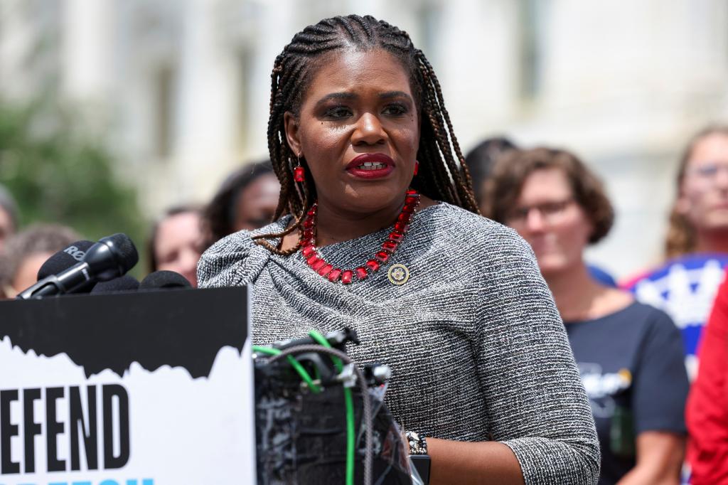 U.S. Representative Cori Bush speaking at a press conference about free speech rights on university campuses, alongside lawmakers and university union members