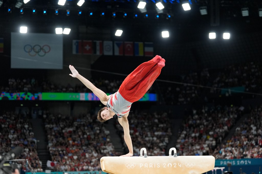 Stephen Nedoroscik, of United States, performs on the pommel during the men's artistic gymnastics team finals round at Bercy Arena at the 2024 Summer Olympics, Monday, July 29, 2024, in Paris, France.