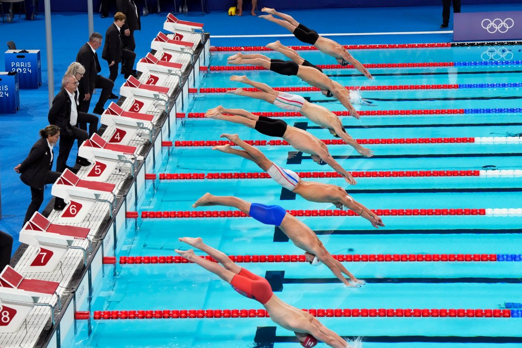 Swimmers compete in the men's 200-meter butterfly final at the 2024 Summer Olympics, Wednesday, July 31, 2024, in Nanterre, France.