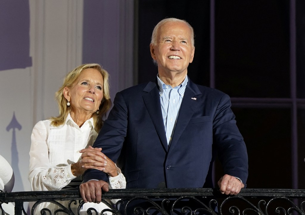 U.S. President Joe Biden and First Lady Jill Biden standing on the balcony of the White House during an Independence Day celebration, July 4, 2024.