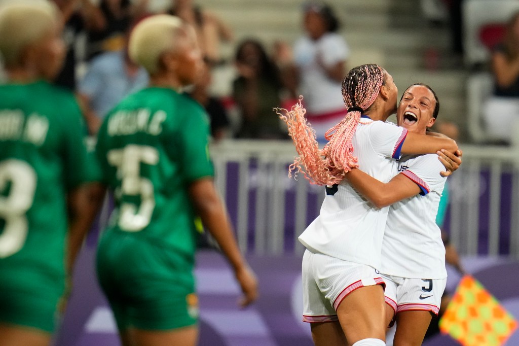 Trinity Rodman (second from right) celebrates her goal with U.S. teammate Mallory Swanson (r.) during the team's Olympics win over Zambia in Nice, France on July 25, 2024.