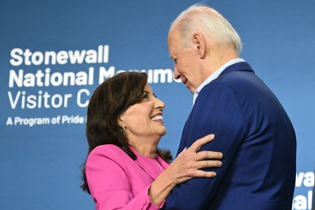 US President Joe Biden embraces New York Governor Kathy Hochul during the Stonewall National Monument Visitor Center grand opening ceremony in New York on June 28, 2024.