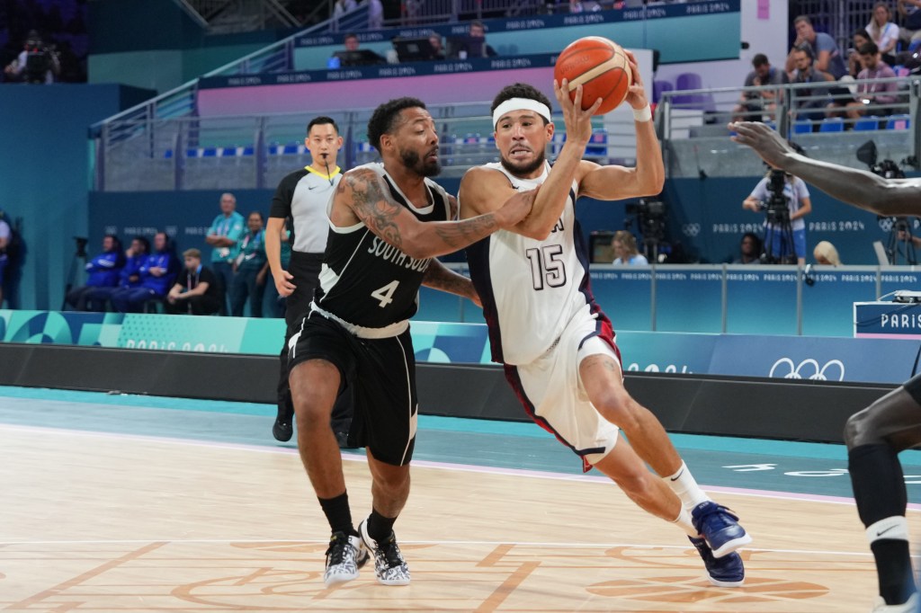 Devin Booker #15 of the USA Men's National Team handles the ball