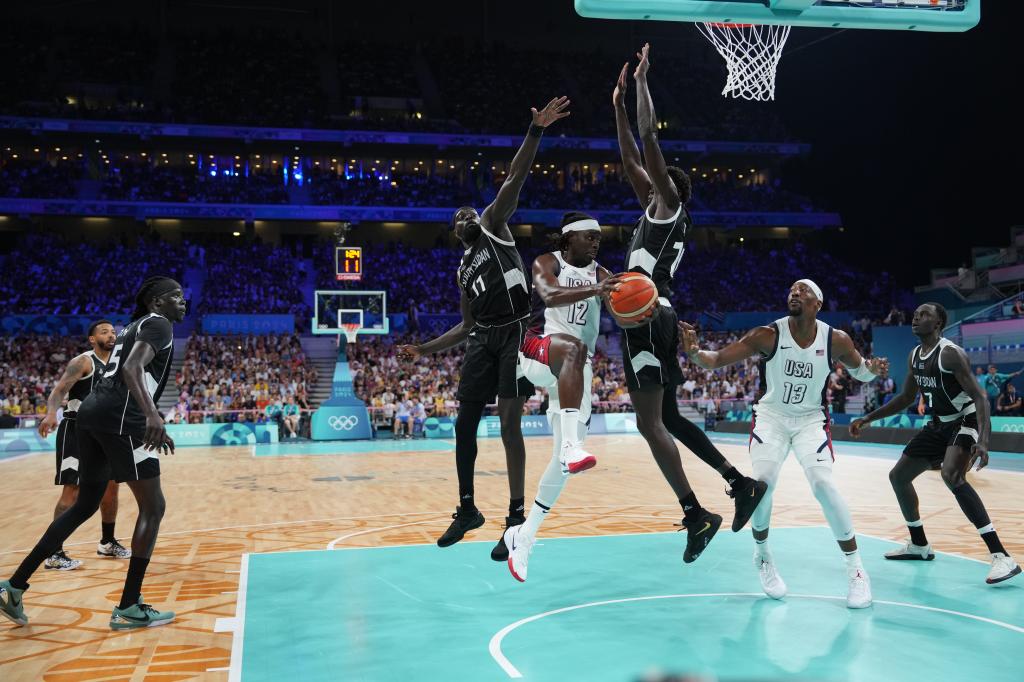 Jrue Holiday #12 of the USA Men's National Team passes the ball