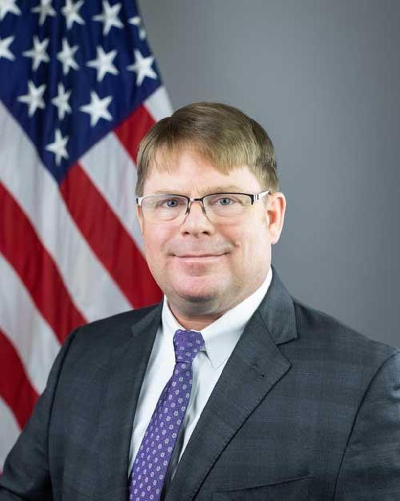 Dr. Kevin O'Connor, President Biden's White House Physician, speaking at a military promotion ceremony