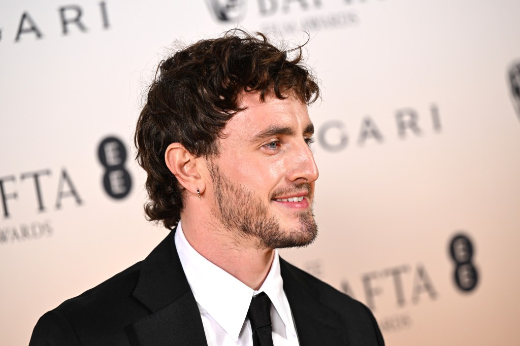 Paul Mescal in a suit attending the EE BAFTA Film Awards 2024 Nominees' Party, supported by Bulgari, at The National Gallery in London, England