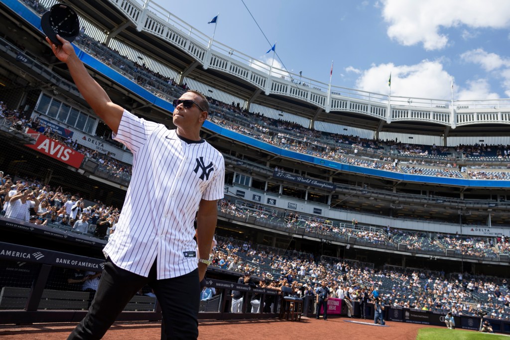 Yankees Alex Rodriguez salutes fans as he walks out to the field for introductions during Old Timerâs Day before a game against the Colorado Rockies, Saturday, Aug. 24, 2024, in Bronx, NY. 