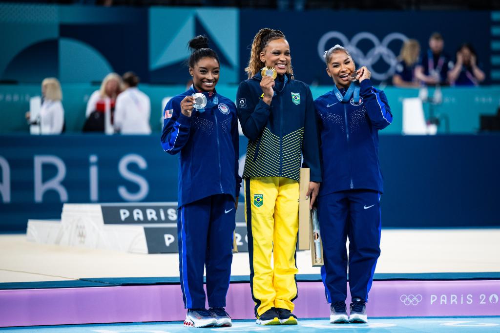 Silver medalist Simone Biles of Team United States, Gold medalist Rebeca Andrade of Team Brazil and Bronze medalist Jordan Chiles of Team United States celebrate after the Artistic Gymnastics Women's Floor Exercise Final on day ten of the Olympic Games Paris 2024 at the Bercy Arena on August 5, 2024