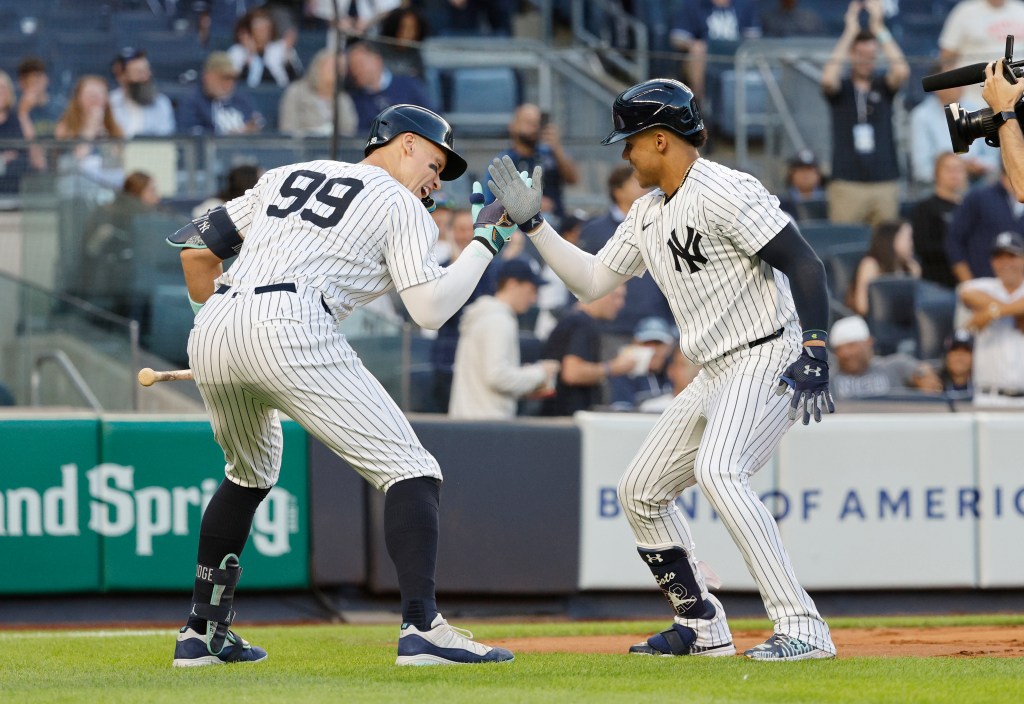 Aaron Judge (right) and Juan Soto, who combined for eight RBIs, celebrate together during the Yankees' 8-0 win over the Guardians on Aug. 21, 2024.