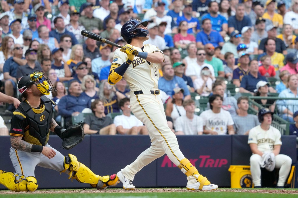 Milwaukee Brewers' Christian Yelich watches as his fly ball is caught in the outfield during the ninth inning of a baseball game against the Pittsburgh Pirates, Thursday, July 11, 2024, in Milwaukee. 