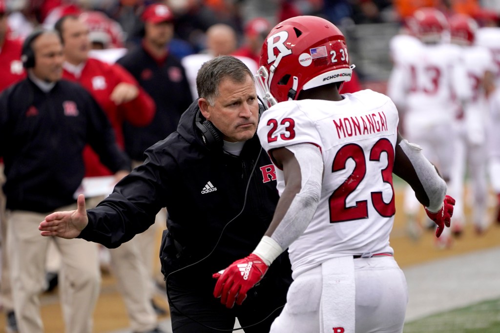 Rutgers running back Kyle Monangai is congratulated by coach Greg Schiano during the Scarlet Knights' game against Illinois on Oct. 30, 2021.