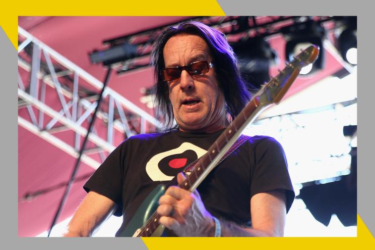 Todd Rundgren shreds on guitar in concert.