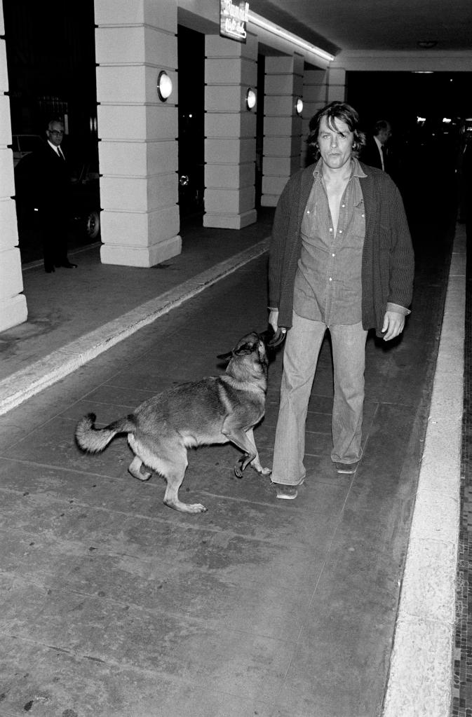 Alain Delon and one of his dogs, 1976.