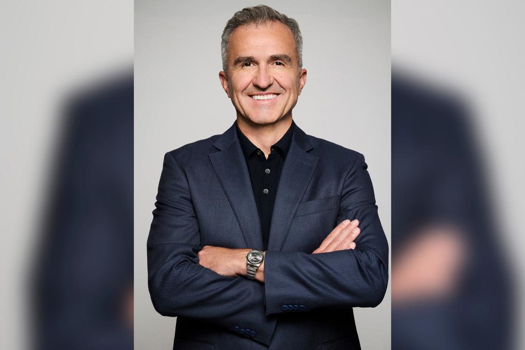 Almin Karamehmedovic, President of ABC News, in a suit for his executive portrait