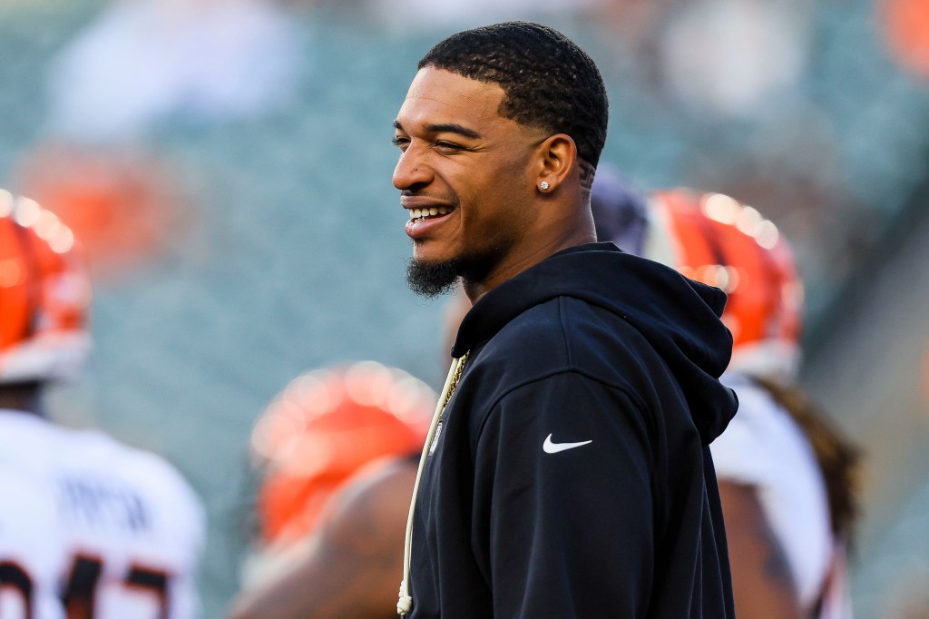 Bengals wide receiver Ja'Marr Chase, who has back at practice on Sunday, stands on the field during warmups before the game against the Indianapolis Colts at Paycor Stadium.