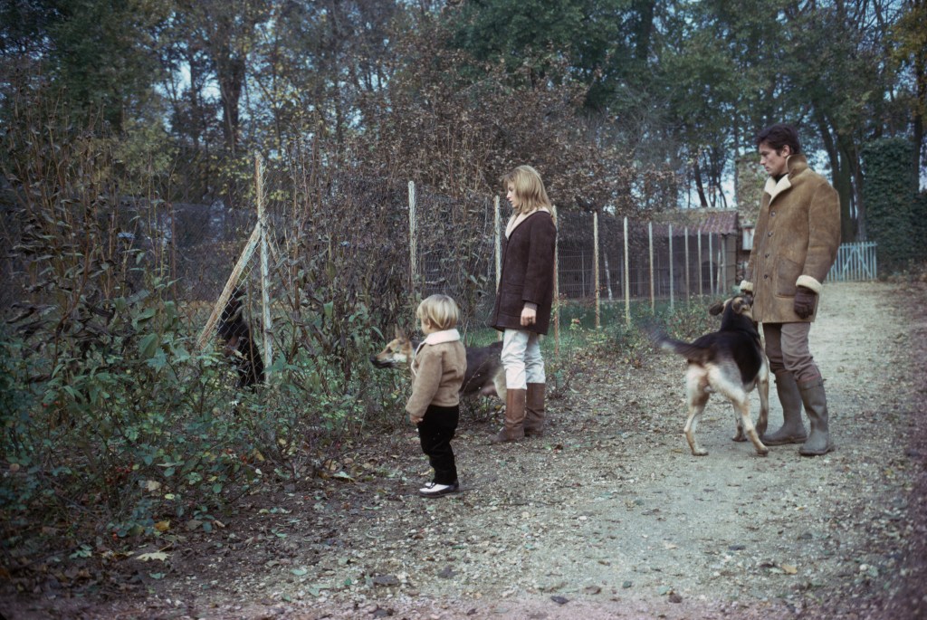 French actor Alain Delon with his wife actress Nathalie Delon, and their son Anthony Delon (born in 1964), at home.  