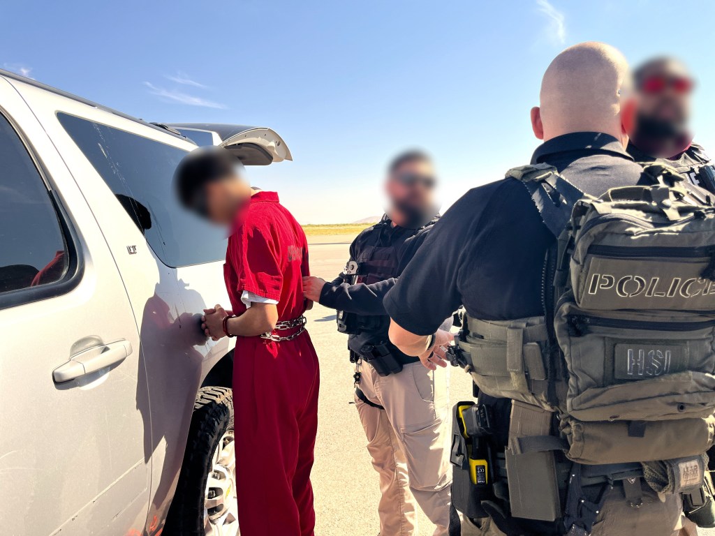 Homeland Security Investigations Las Cruces NM special agents arresting gang member Jean Torres-Roman for the Denver jewelry store robbery.