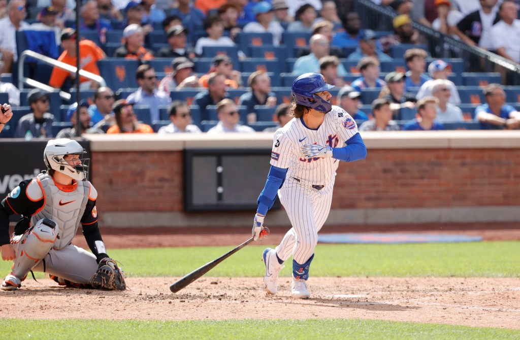 New York Mets left fielder Jesse Winker hits a walk off home run during the 9th inning.