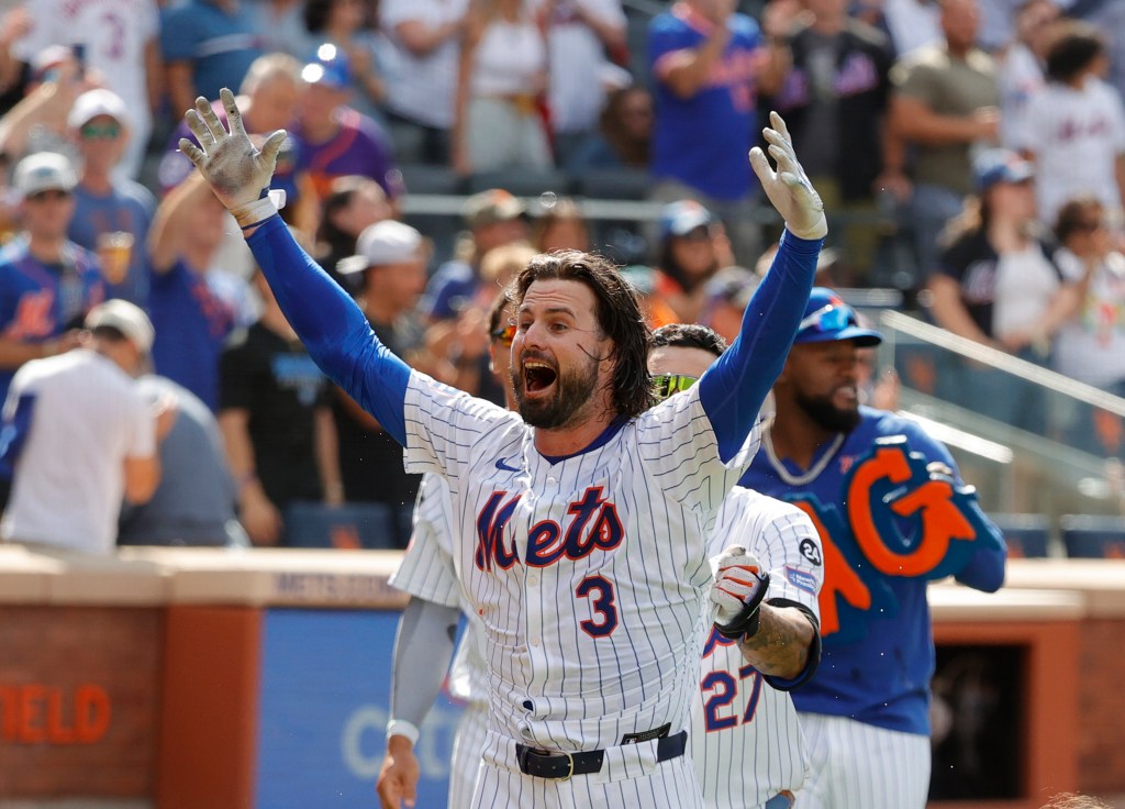 Mets left fielder Jesse Winker reacts after he hits a walk off home run