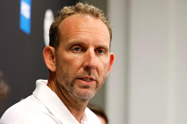 Nets GM Sean Marks speaks at a press conference.