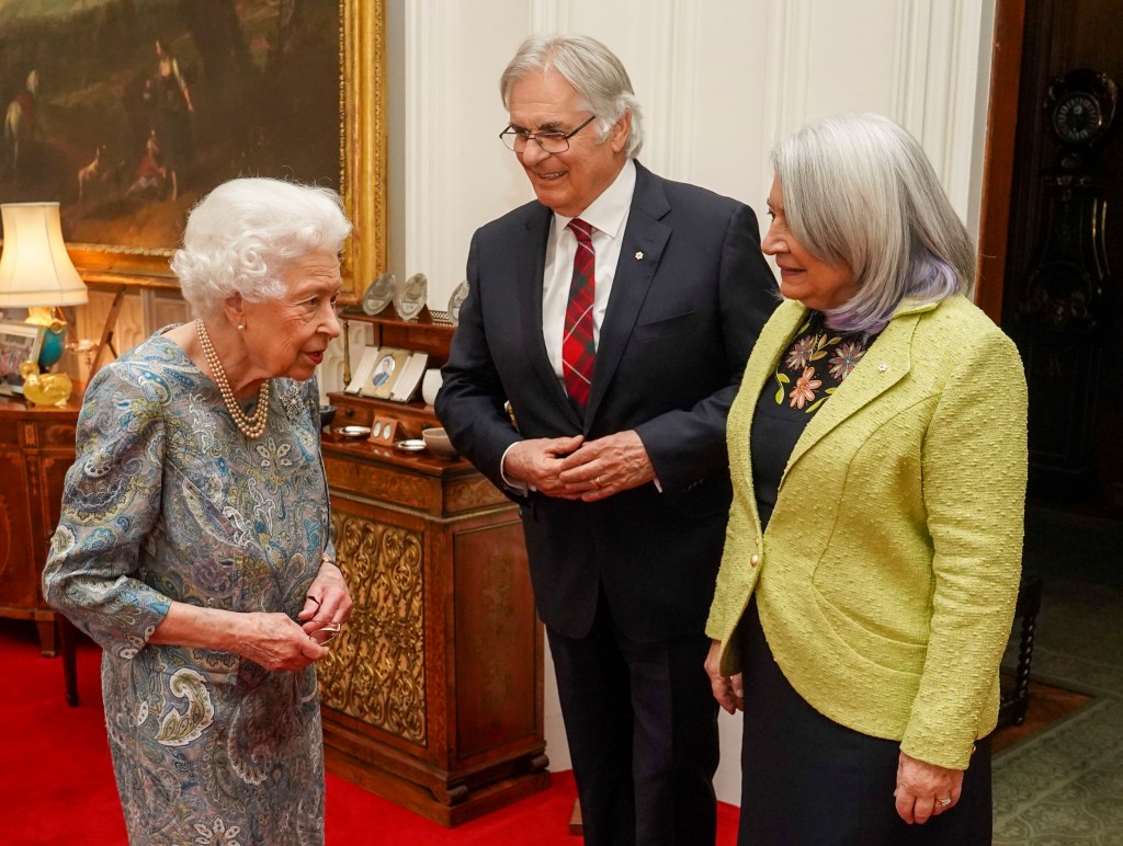 Queen Elizabeth II welcomes the Governor General of Canada, Mary Simon, and her husband, Mr Whit Fraser, for tea at Windsor Castle on March 15, 2022 in Windsor, England.