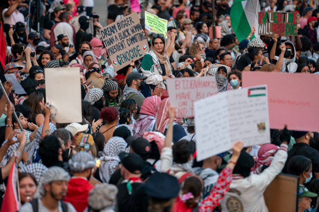 Pro-Palestinian leader Nerdeen Kiswani speaking to supporters at a protest outside a Kamala Harris campaign event in New York City, August 14, 2024.