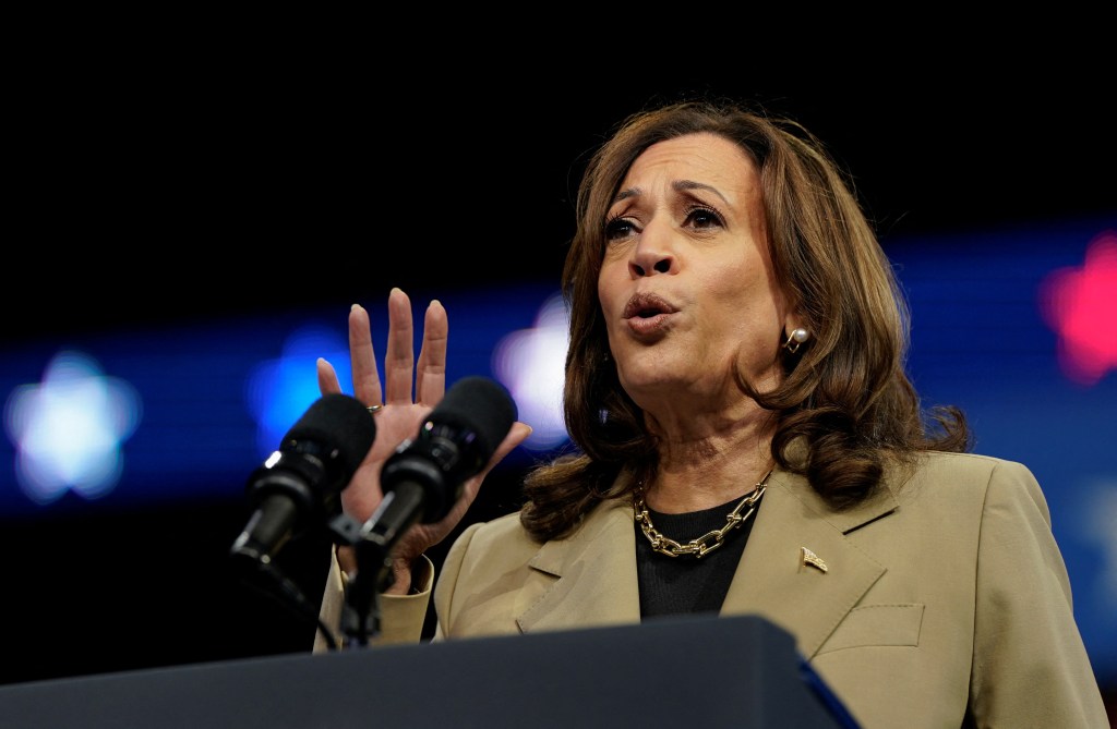 U.S. Vice President Kamala Harris speaking at a campaign rally with Minnesota Governor Tim Walz in Glendale, Arizona