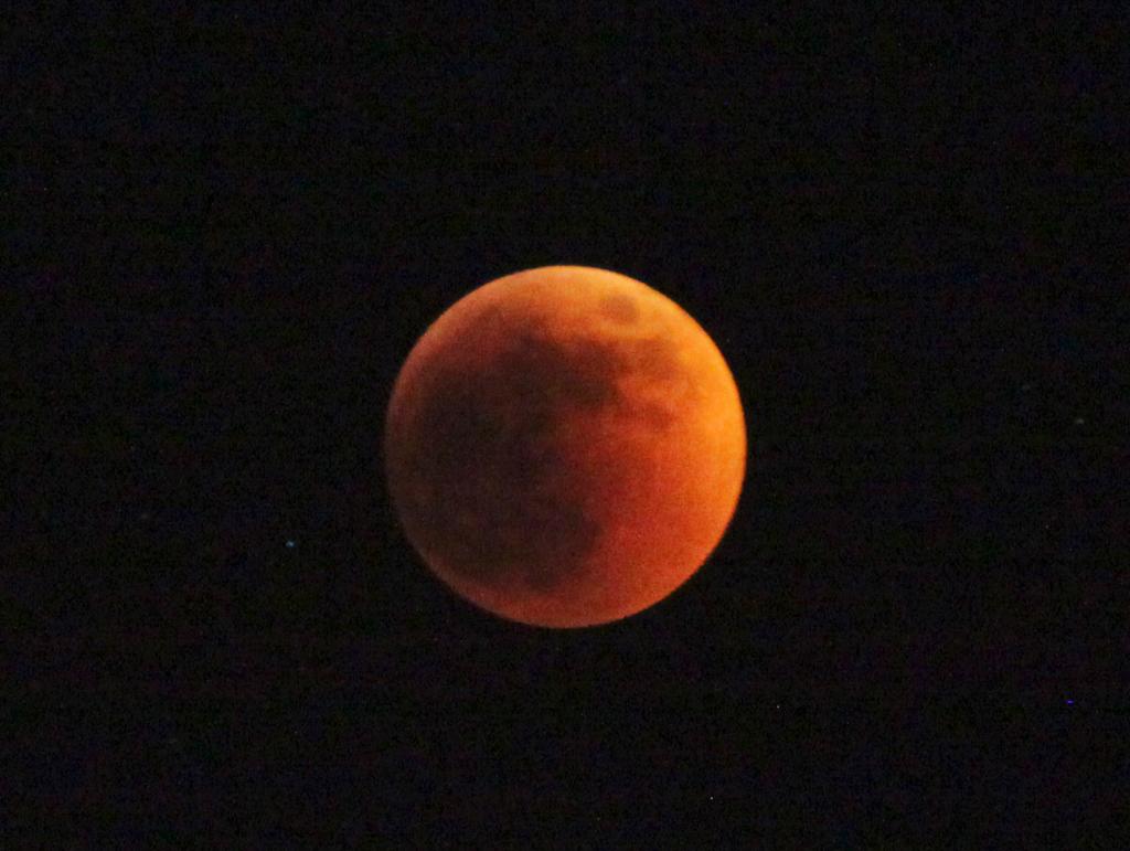 The moon turns red  during total Lunar Eclipse of the moon seen in Nairobio, Kenya, June 15, 2011. 