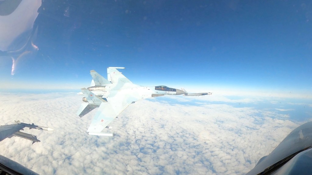 Footage of a a Russian fighter jet flying close to a NORAD aircraft over the Alaska Air Defense Identification Zone.