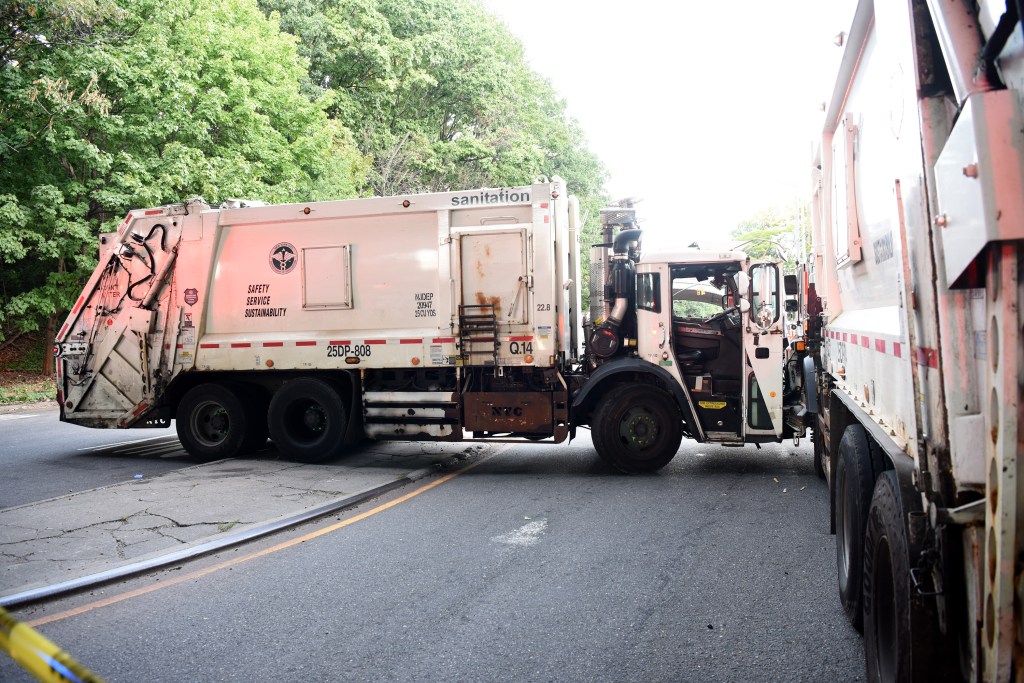 Sanitation trucks in Queens