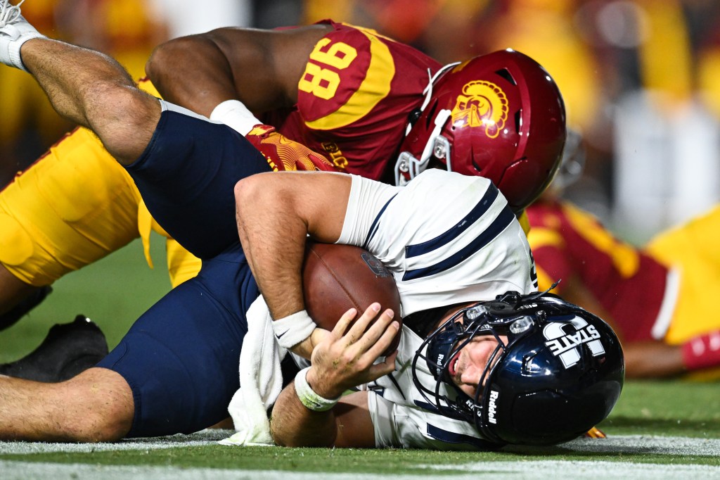 USC defensive end Devan Thompson registers a sack against Utah State on Sept. 7, 2024.