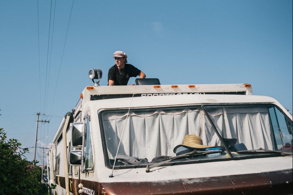 Brad Butterfield pauses after checking the top of his RV for leaks in Arcata on Aug. 24, 2024.