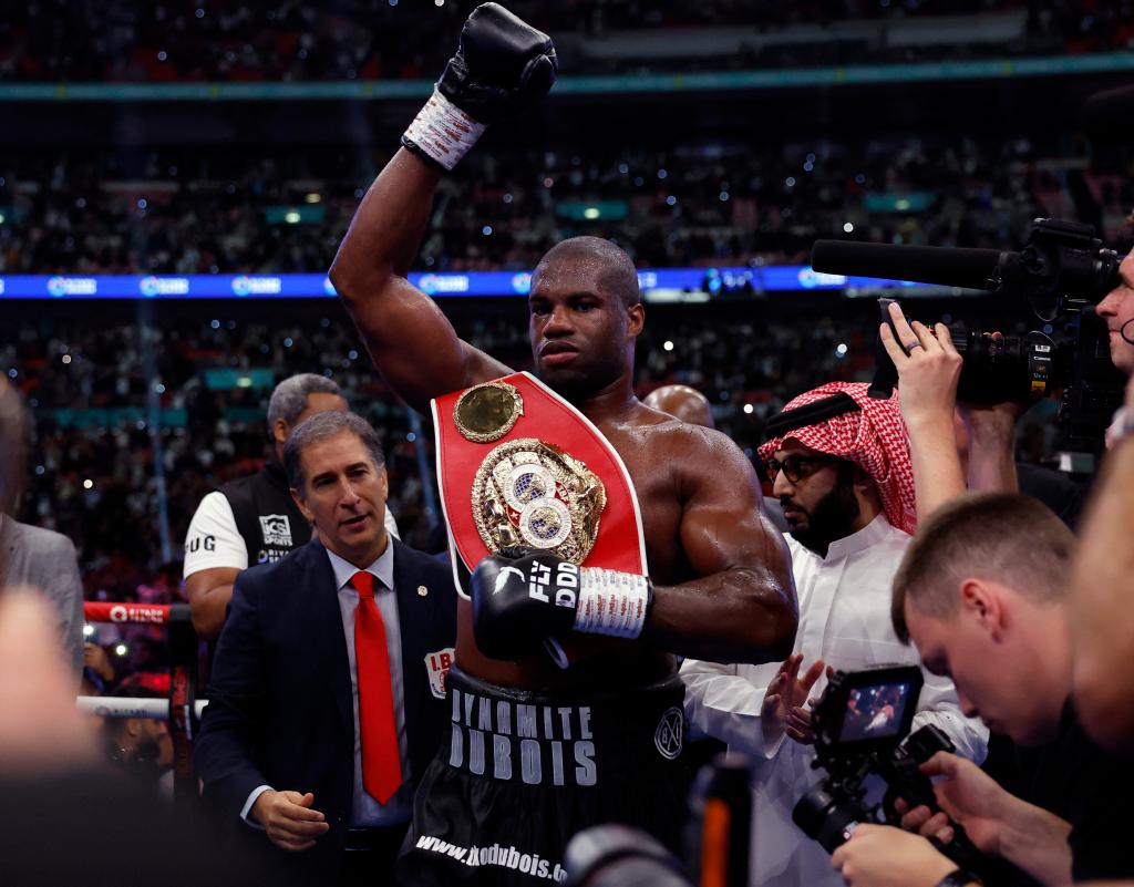 Daniel Dubois celebrates after his fifth-round knockout victory over Anthony Joshua.