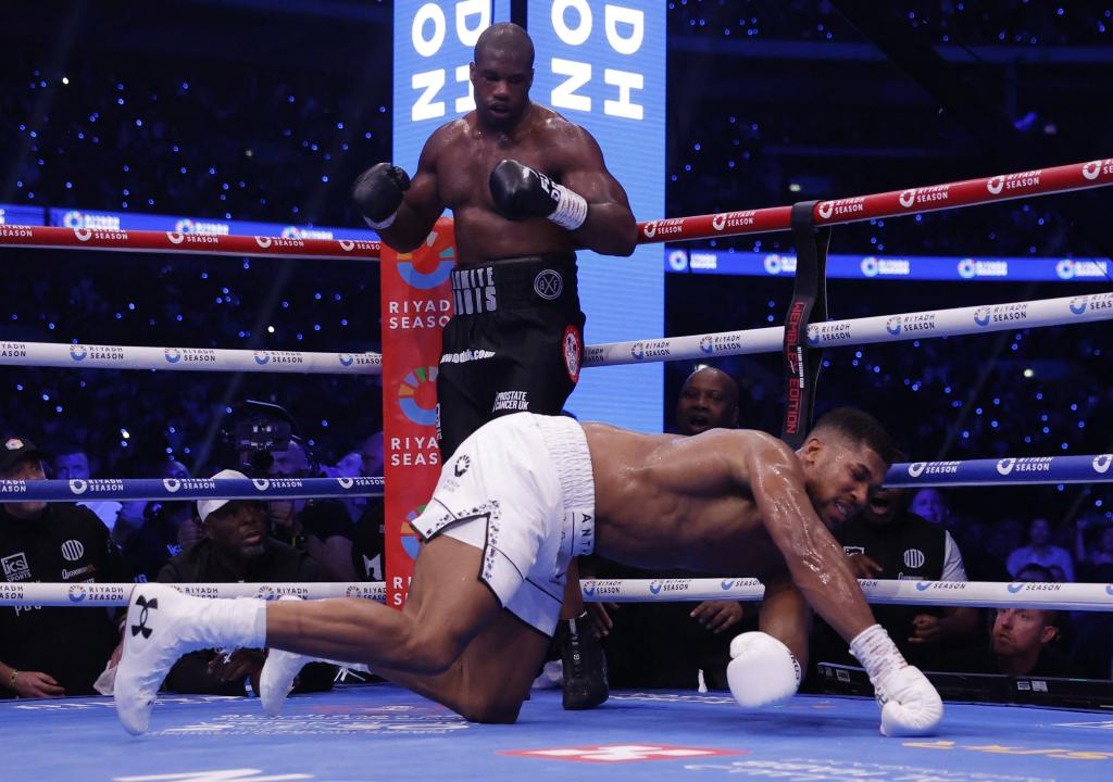 Daniel Dubois knocks out Anthony Joshua in the fifth round to retain his IBF heavyweight title.