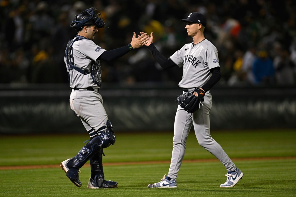 Austin Wells (left) has impressed the Yankees with his improvements behind the plate.