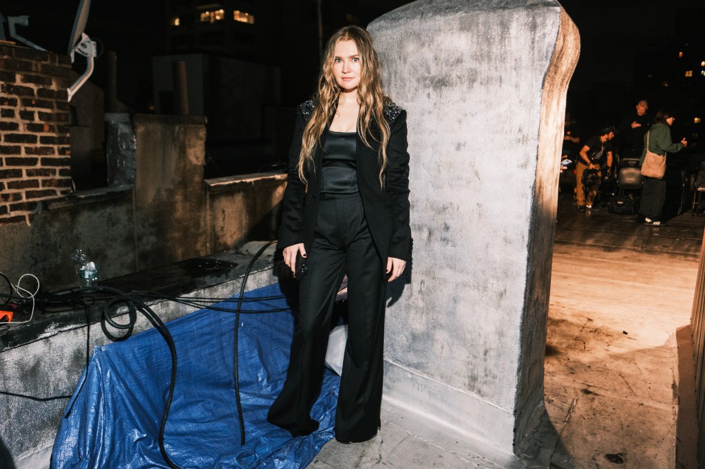 Anna Delvey at Kelly Cutrone & Anna Delvey Present SHAO S/S 24, which took place at on her roof in the East Village while she is under house arrest. 