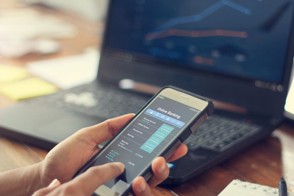 Businessman using mobile smartphone with data information banking network connection on screen, mobile banking and online payment.